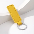 Minimalist rectangular yellow PU leather keychain with silver metal ring on white background - Rectangle / Yellow
