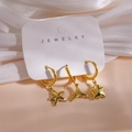Detailed shot of three 14K gold plated earrings with starfish, whale tail and star charms - Starfish Whale Tail Smile Style (Card A) / 3 Piece Set