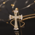 Macro shot of gold-plated cross pendant with micro-pave cubic zirconia crystals - Gold Full Diamond Radial Style (款式39)