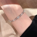 Elegant silver OT clasp bracelet featuring rectangular cubic zirconia in a minimalist style - Silver
