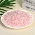 Natural raw pink rose quartz crystal crushed stones displayed in a white ceramic dish - Rose Quartz Deep Color Enhanced (7-9mm) 100g