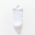 Single pair of disposable white low cut cotton ankle socks with elastic ribbed cuffs - A Pair Of White Polyester-cotton Blend Shoes / One Size