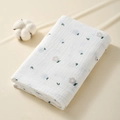 Folded soft white cotton muslin baby towel with floral print and decorative raw cotton - 100*100cm / Bluebell