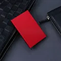 Red aluminum RFID blocking card holder with automatic pop-up lever for minimalist use - Red