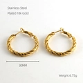 Detail view of 30mm twisted 18k gold plated stainless steel hoop earrings weighing 6.75g - 18K Gold / Gold