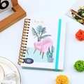 A6 spiral notebook featuring Slow Life pink sofa illustration and light blue elastic band - Home Life - White