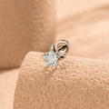 Star-shaped stainless steel stud earring with light blue gem on a beige display stand - Light Sea Blue (Single Piece)