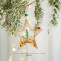 Star-shaped wooden Christmas ornament with tree and reindeer carving for festive decor - Christmas Star