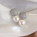 Elegant square zircon paved stud earrings with large white pearls on white silk fabric - Milk White Pearl