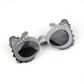 Detail of gray crocodile-shaped toddler sunglasses with a pirate hat design and dark lenses - Gray