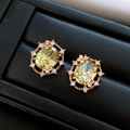 Elegance 18k gold plated stud earrings featuring a yellow oval zircon with halo design - Earrings Only / Gold-Green