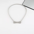 Detail of silver spring belt featuring a sparkling rhinestone bow buckle on white background - Bowknot Rhinestone Buckle Spring Chain (Silver)