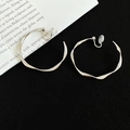 Silver geometric twisted clip-on hoop earrings for unpierced ears with silicone pads - 4cm / Silver