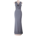 Detailed view of the sleek gray backless maxi dress with a deep V-neckline and draped fabric - XS / Gray