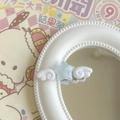 Détail d'une pince à cheveux étoile bleu clair avec ailes blanches sur bord de miroir - Étoile Gelée avec Ailes [Bleu]
