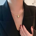 Chic gold-plated snake chain necklace with a polished round mirror pendant for women - Gold