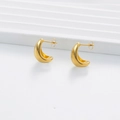 Minimalist golden crescent C-shaped stainless steel earrings on a white podium - Gold Crescent Geometric Style (QRH5535)