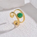 Verstelbare gouden dubbellaagse ring met groene edelsteen en vintage kralen textuur - Verstelbaar Open / Groene ovale edelsteen gouden stijl