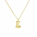 Macro view of polished 18k gold plated bubble letter E pendant on a thin link chain - Necklace E