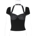 Detail of retro black halter top featuring white polka dot patterns and cropped fit - S / Black