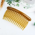 Amber resin 16-tooth hair comb clip for women featuring a minimalist round design - Round 15 Teeth / Ginger Yellow