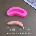 Detail view of pink 3D banana mousse silicone mold with JY-1626 model and finished product - 3D Small Banana