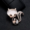 Elegant rose gold cat brooch featuring a milky opal stone and pavé crystal accents - Fox Opal Rose Gold