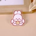 Cute acrylic bunny brooch featuring a white rabbit holding a yellow star charm - Creamy Angel Rabbit