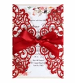 Detailed laser-cut red wedding invitation with elegant satin bow and floral inner page - Red