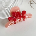 Pink acetate hair claw clip with red rhinestone butterfly detail on a white surface - 8cm / Pink