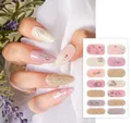 Detail of YS-011 floral nail wraps in nude pink with fine glitter and dried flower accents - YS-011 (Pink Gold Foil Dried Flower)
