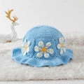 Close-up of blue hand-crocheted bucket hat with detailed 3D daisy flower embroidery - One Size / White Daisy Blue Base
