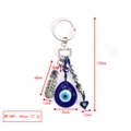 Detail of blue evil eye keychain with silver feather and heart charm pendants - Deep Blue Feather Pendant