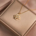Elegant gold titanium steel necklace featuring a double-layered white floral clover pendant - X0622 White Rotating