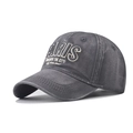 Close-up of Paris 3D embroidery on washed cotton fabric of a dark grey baseball cap - Adjustable / Gray