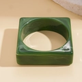 Close-up of square green marble texture acrylic bangle with internal cloud patterns - Green