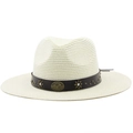 Detailed view of woven straw hat featuring vintage leather band with floral metal studs - Cream