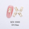 Detalle de dijes de mariposa dorada para uñas con piedras de opale blancas y arte de uñas - Estilo Mariposa Dorada Ojo de Gato Blanco (8900)