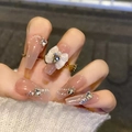 Elegante nude-rosa mittellange Kunstnägel mit 3D-weißer Schleife und Kristallsteinen - Z677 Eisige Schleife