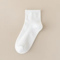 White anti-slip cotton baby socks with silicone grip dots on a beige background - Single Ribbed White (Dotted Flat) / 8mo-2yr XS (Foot 9-12cm)