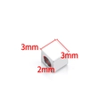 Macro detail of 3mm silver stainless steel cube spacer beads for jewelry making - Polished Square Bead / 3x3mm / Steel