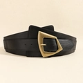 Detail of a wide black elastic waist belt with a vintage gold geometric buckle - Black