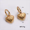 Golden stainless steel heart earrings with vintage embossed scroll patterns and dimensions - Amleh044