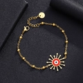 Detail of gold stainless steel chain bracelet with evil eye sun pendant and S.STEEL tag - Style 9 (Red Eye Bead)