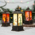 Close-up of festive LED Christmas lantern with vintage bronze finish and snowman illustration - Starry Small Snowman / Gold