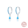 Macro detail of S925 sterling silver hoop earrings with water drop blue gemstones - Platinum-Turquoise