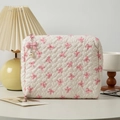 White quilted cosmetic bag with pink bow pattern and pearl charm accessory - Medium / White Pink