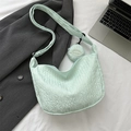 Mint green textured bubble crossbody bag with matching round coin purse and wide strap - Light Blue