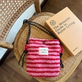 Pink and red striped plush crossbody bag with woven rope strap on a vintage chair - Pink Stripe