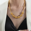 Modern gold-tone spring coiled collar necklace featuring minimalist metallic spiral textures - Gold (P1777)